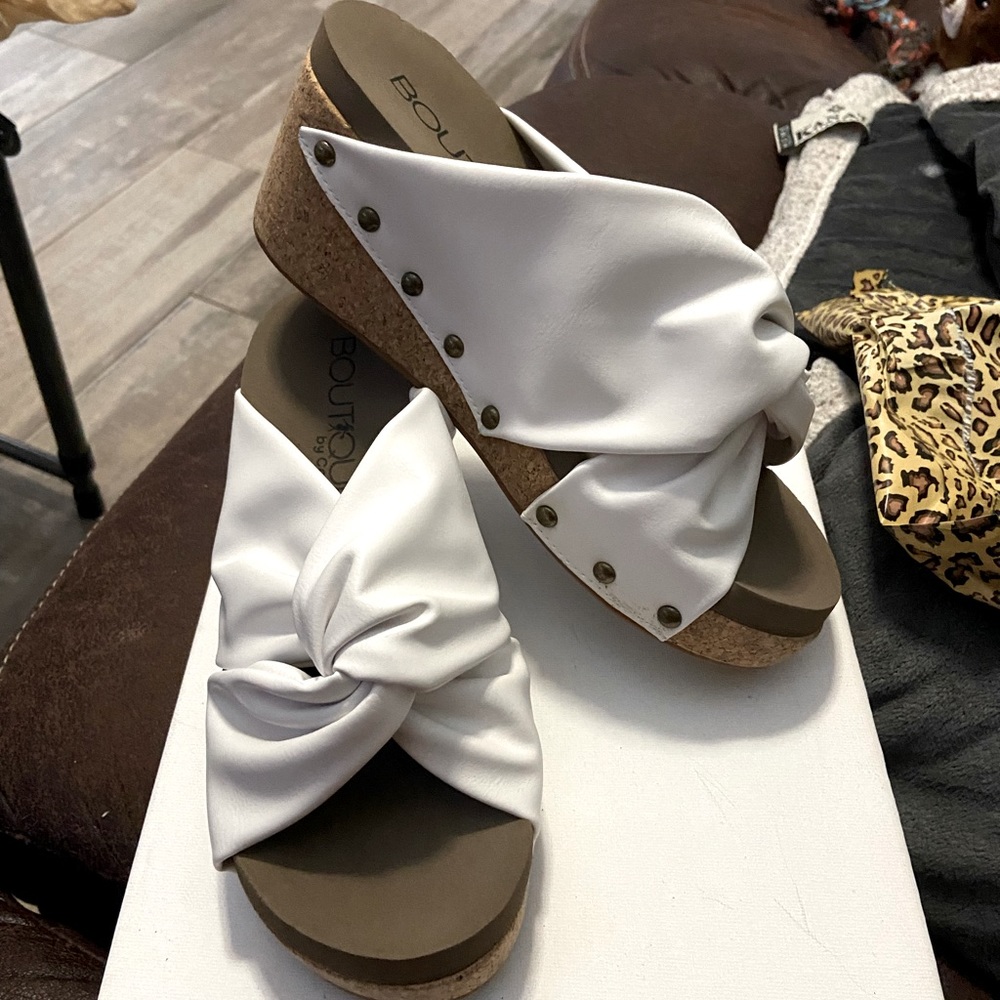 Cheerful white wedges by Corky’s . Size 7. Brand new, never worn.